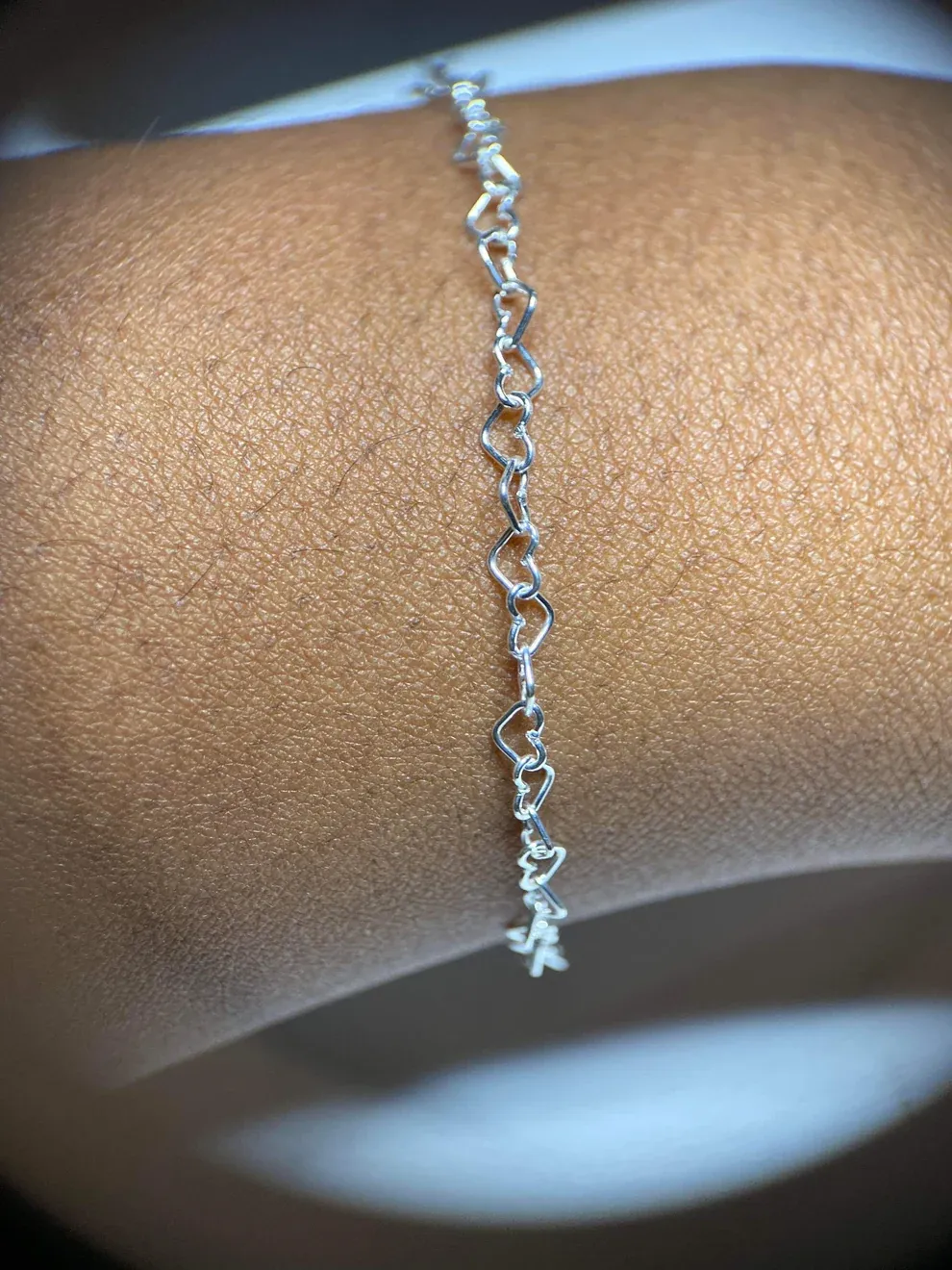 Sterling silver heart-link permanent bracelet